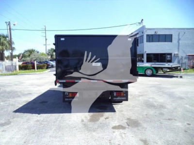 Isuzu NPR-HD truck rear view showing tail lights and bumper; black cargo body with gray graphic hand and wave design.
