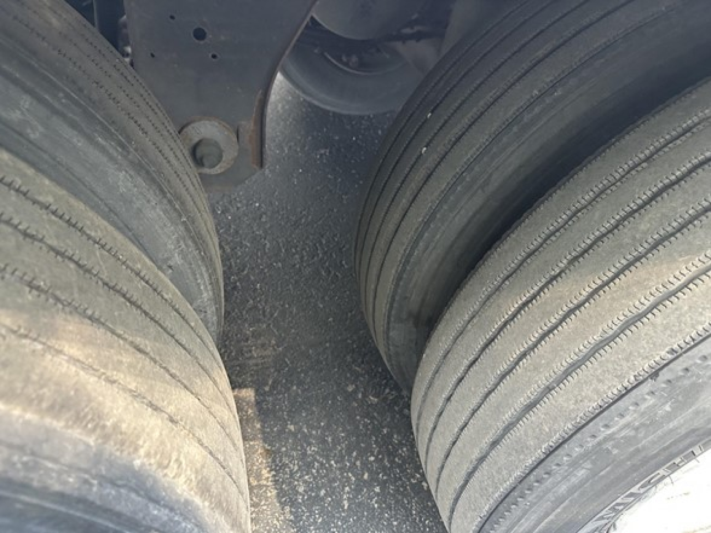 Trailer dual tires view showing tandem axle wheels and tire treads