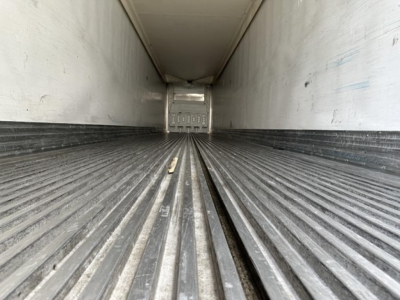 Trailer interior cargo area of a 2017 Great Dane S-600 reefer trailer showing ribbed steel floor and rear door edge.