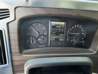 Dashboard of a new Western Star 47X showing instrument cluster with speedometer, tachometer, digital display, and fuel gauges.