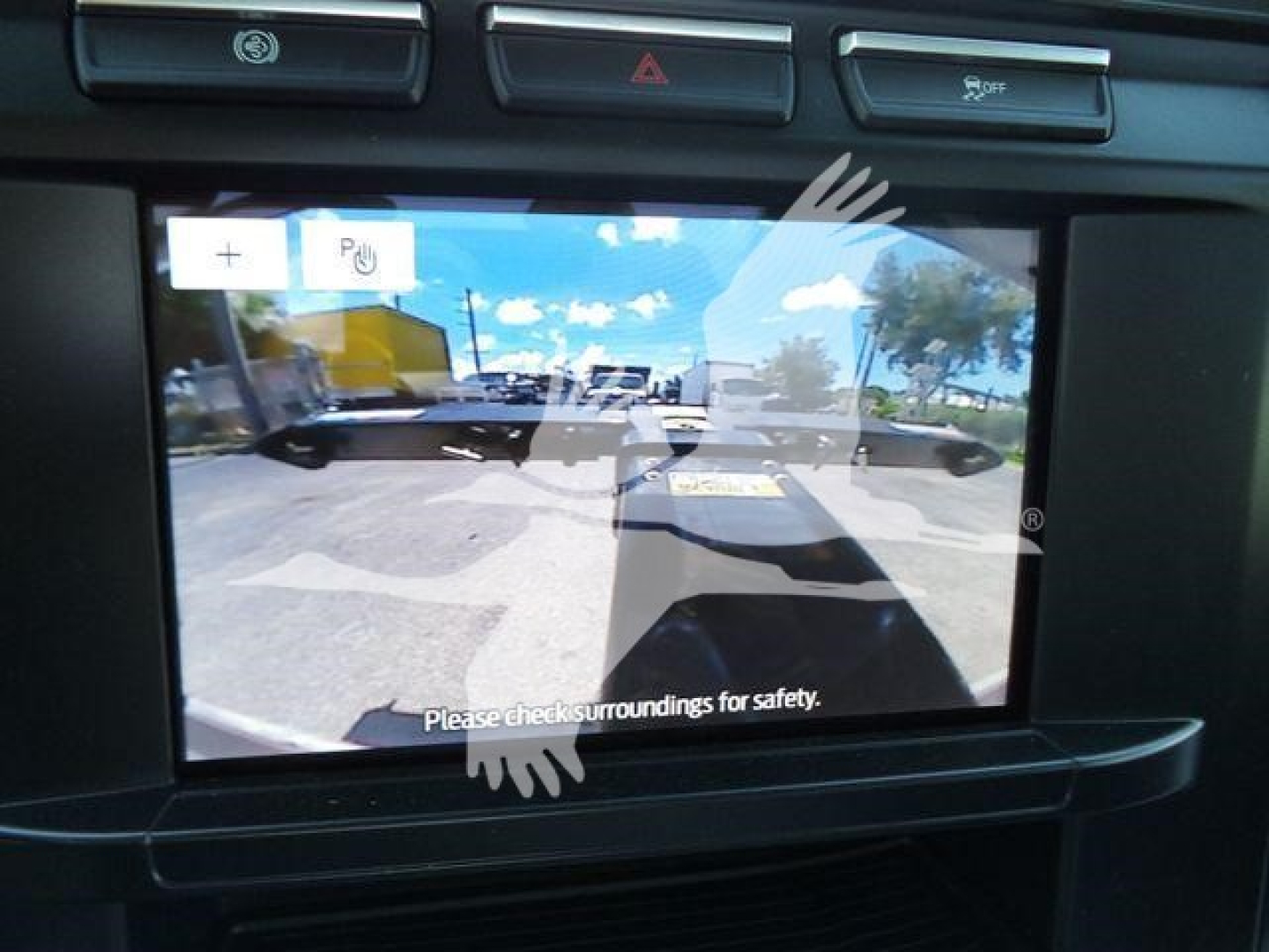 Ford F-600 XLT rollback truck dashboard screen showing rearview camera feed.