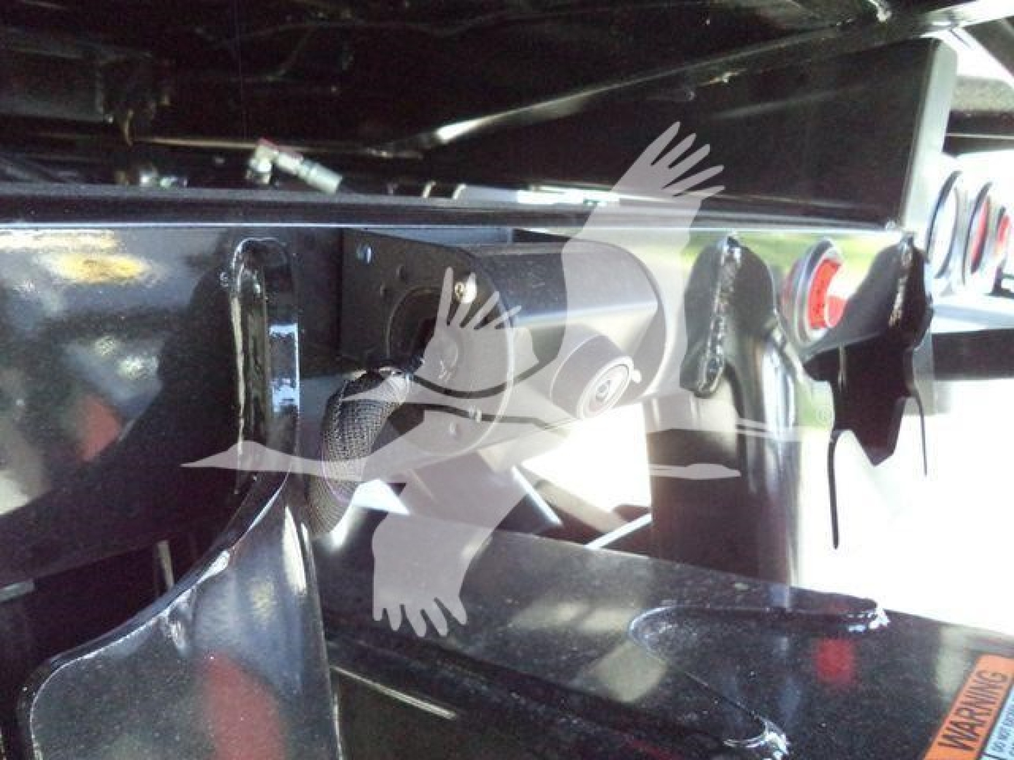 Ford F-600 XLT rollback truck hitch area showing trailer hookups and rear assembly.