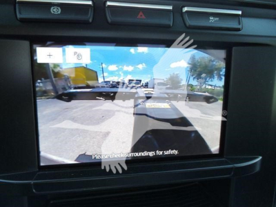 Ford F-600 XLT rollback truck dashboard screen showing rearview camera feed.