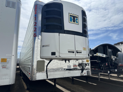 Utility trailer 2022 3000R reefer unit at the front of a trailer showing TT logo on radiator housing and rear doors, vertical red serial 3000R 1226 on left edge.