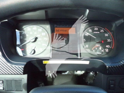 Dashboard view of a 2025 Hino 268A rollback truck showing gauge cluster and center display with odometer and tachometer visible.