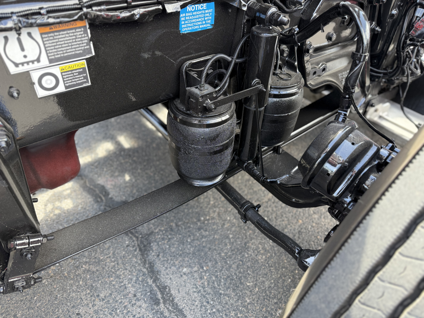 Peterbilt 389 chassis view showing air tanks and suspension components