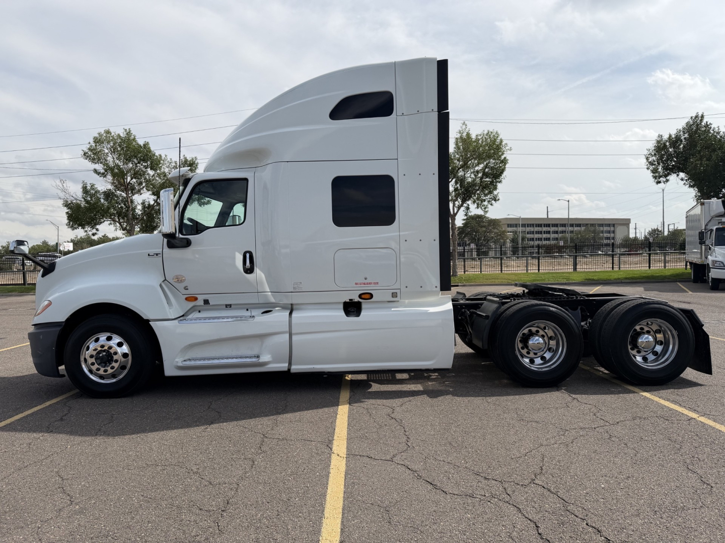 2019 International LT625 sleeper tractor side view with cab and rear wheels; no visible labels readable on image.
