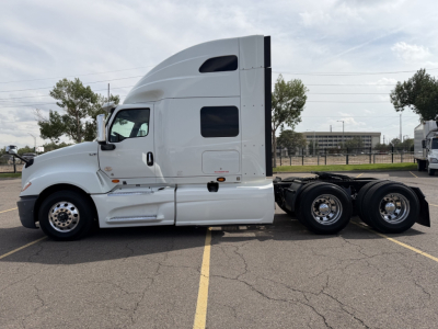 2019 International LT625 sleeper tractor side view with cab and rear wheels; no visible labels readable on image.