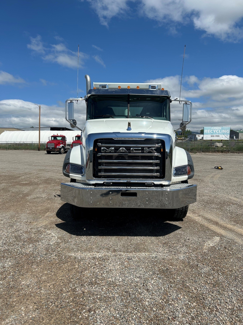 Mack GR104B front view showing chrome grille and bumper with large MACK logo on grille.
