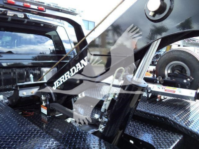 Ram 4500 Big Horn winch truck interior with black metal diamond plate floor and winch assembly visible