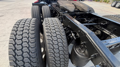 International LT625 chassis showing dual rear axles with heavy-duty tires and frame rails.