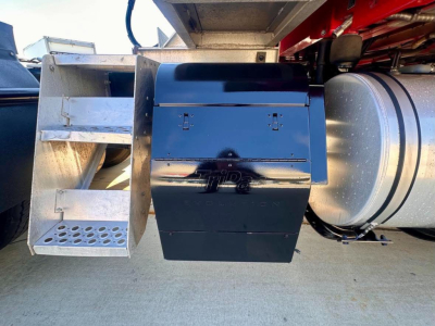 Kenworth T680 component area showing fuel tank and storage toolbox mounted under sleeper cab