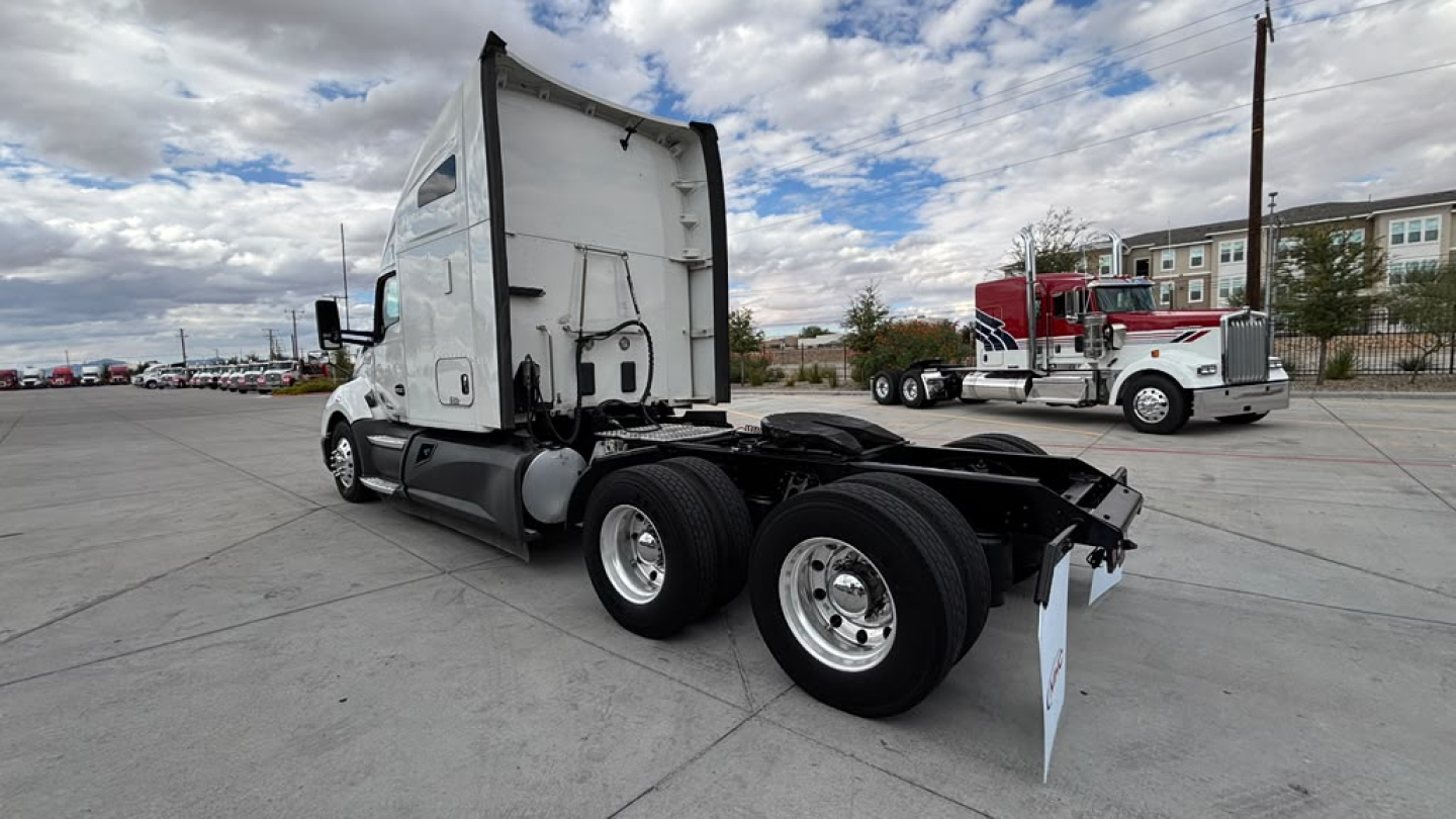 Kenworth T680 tractor rear view showing chassis and dual rear axles, Sleeper cab, no trailer attached.