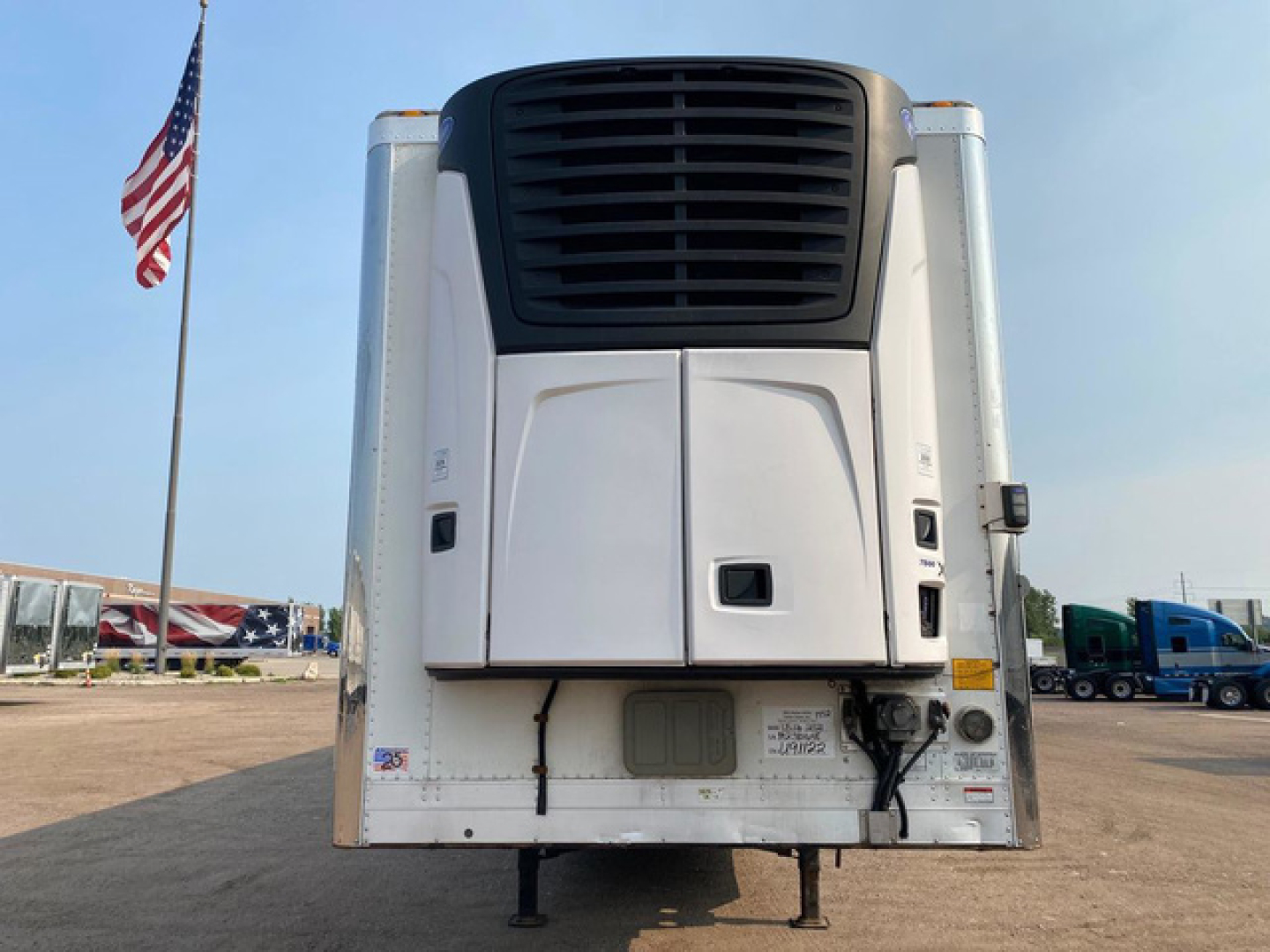 Refrigerated trailer front view showing reefer unit and intake grille on a 2021 Utility Reefer with stock U91122 and VIN 1UYVS2535M2382648.