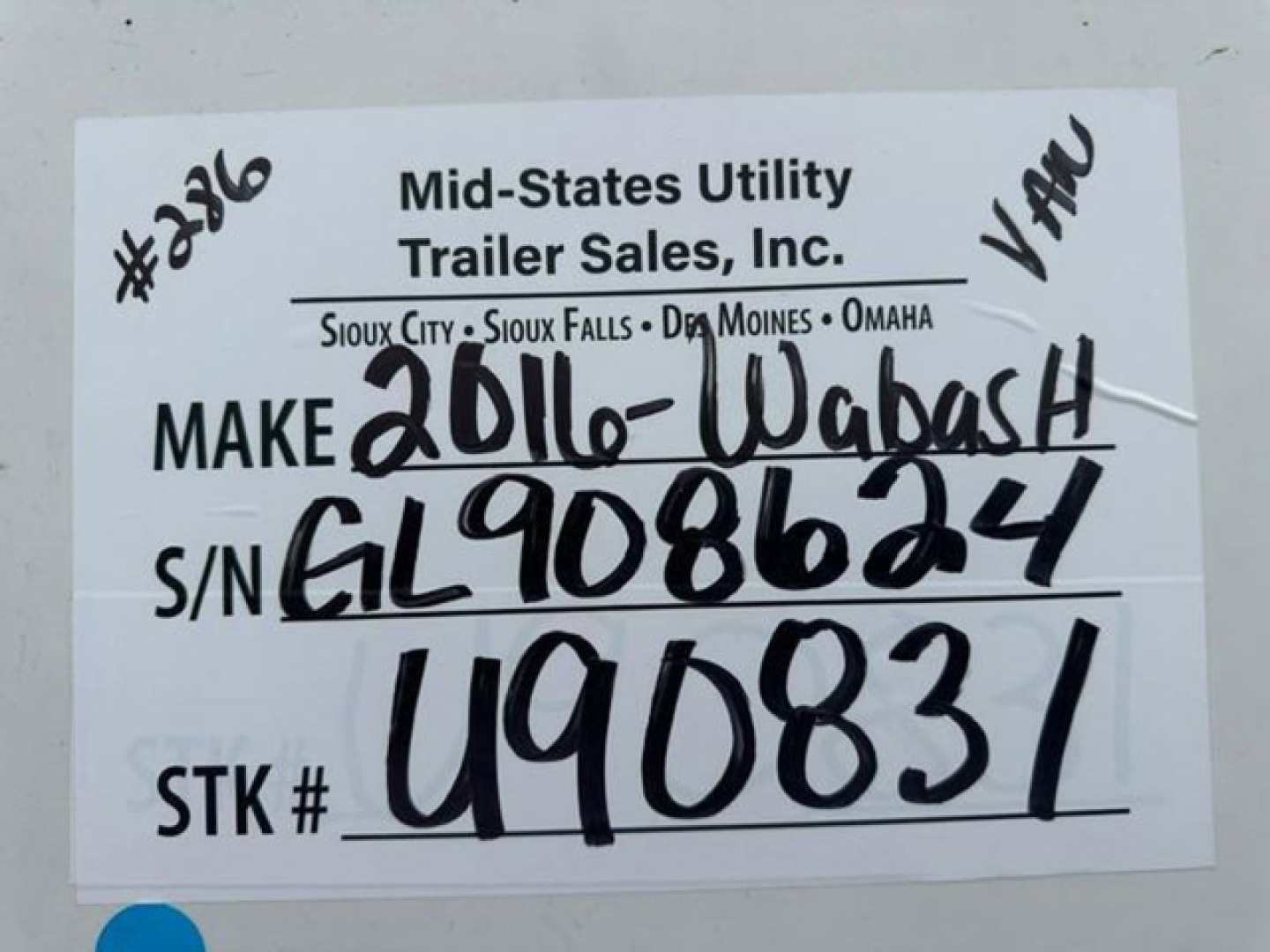 Tag on a used trailer showing 'Mid-States Utility Trailer Sales, Inc.' with handwritten model '2016-Wabash', serial 'EL908624', stock 'U90831', VIN '1JJV532D6GL908624'