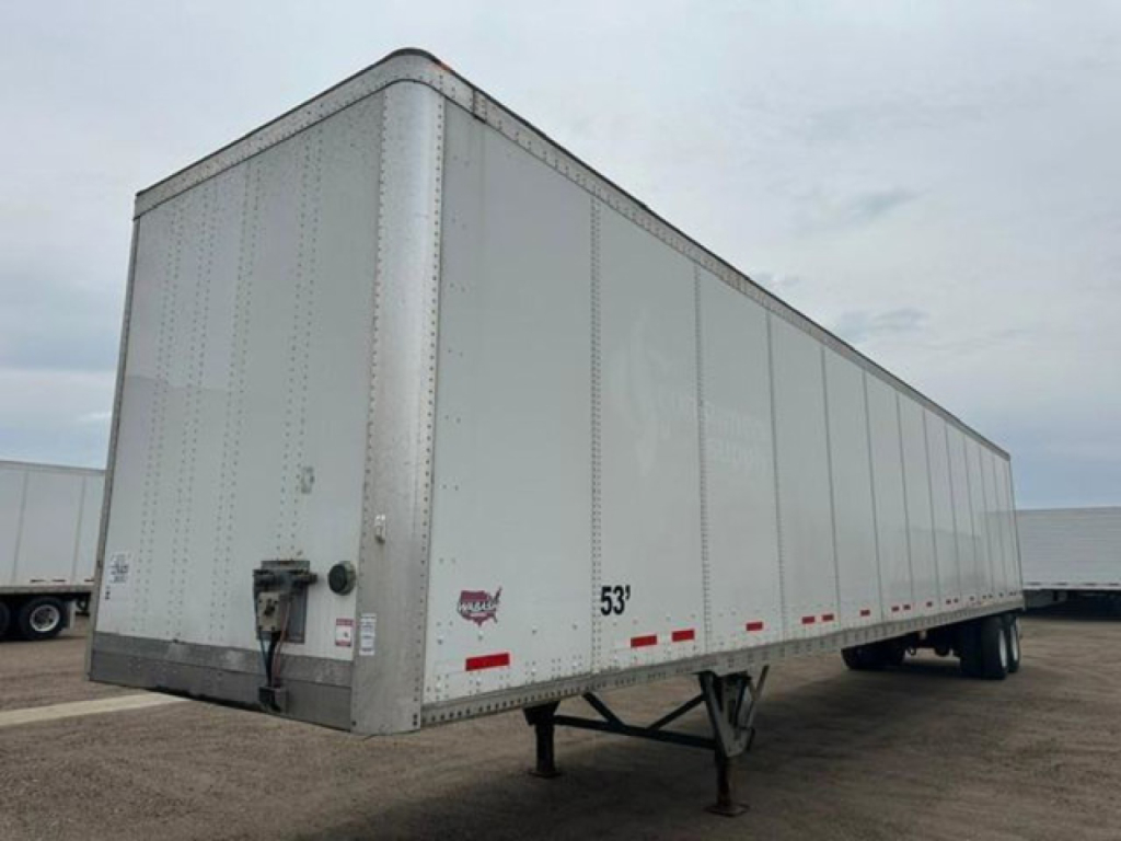 trailer showing 53' Wabash box with standard rear hitch and landing gear, silver exterior, side markers, VIN 1JJV532D6GL908624 visible, stock U90831