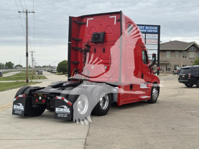Freightliner Cascadia 126 truck rear-left side view showing red sleeper cab and dual rear axles.