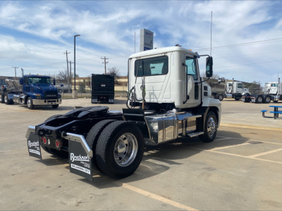 Truck chassis with cab in view, rear wheels and fifth wheel visible, Mack AN42T title not visible.