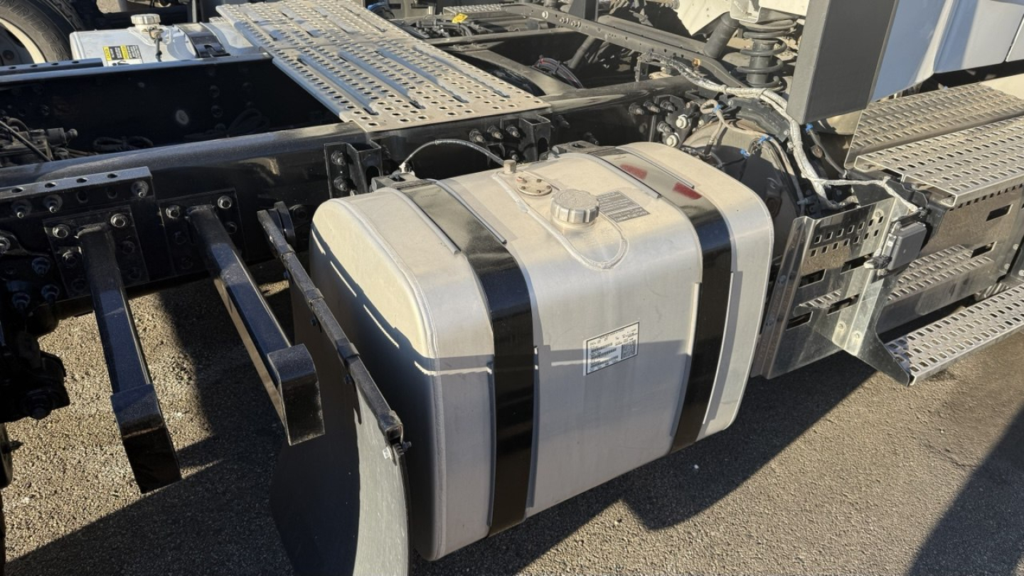 Volvo VNR300 day cab fuel tank and chassis rails showing metal fuel tank with straps and surrounding frame