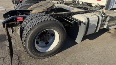 Volvo VNR300 4x2 single axle day cab chassis showing fuel tank and dual rear wheels