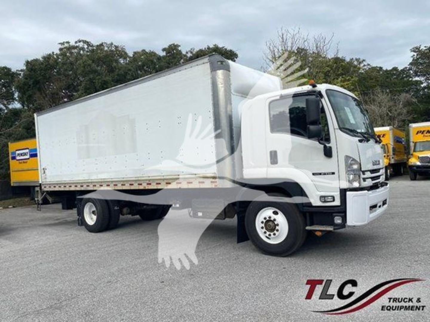 Isuzu FTR box truck side view showing cargo box and cab with front bumper and wheel.