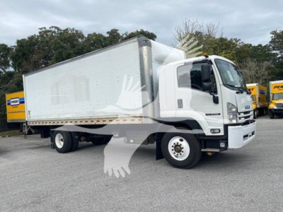 Isuzu FTR box truck in side view showing cargo body and cab with white exterior.