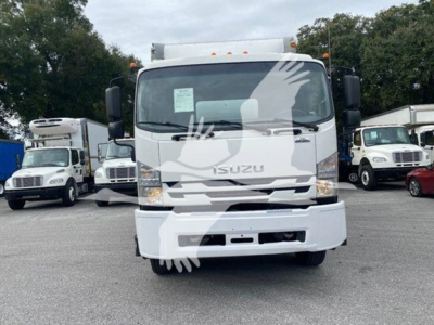 Isuzu FTR box truck front view showing cab, grille, and bumper.