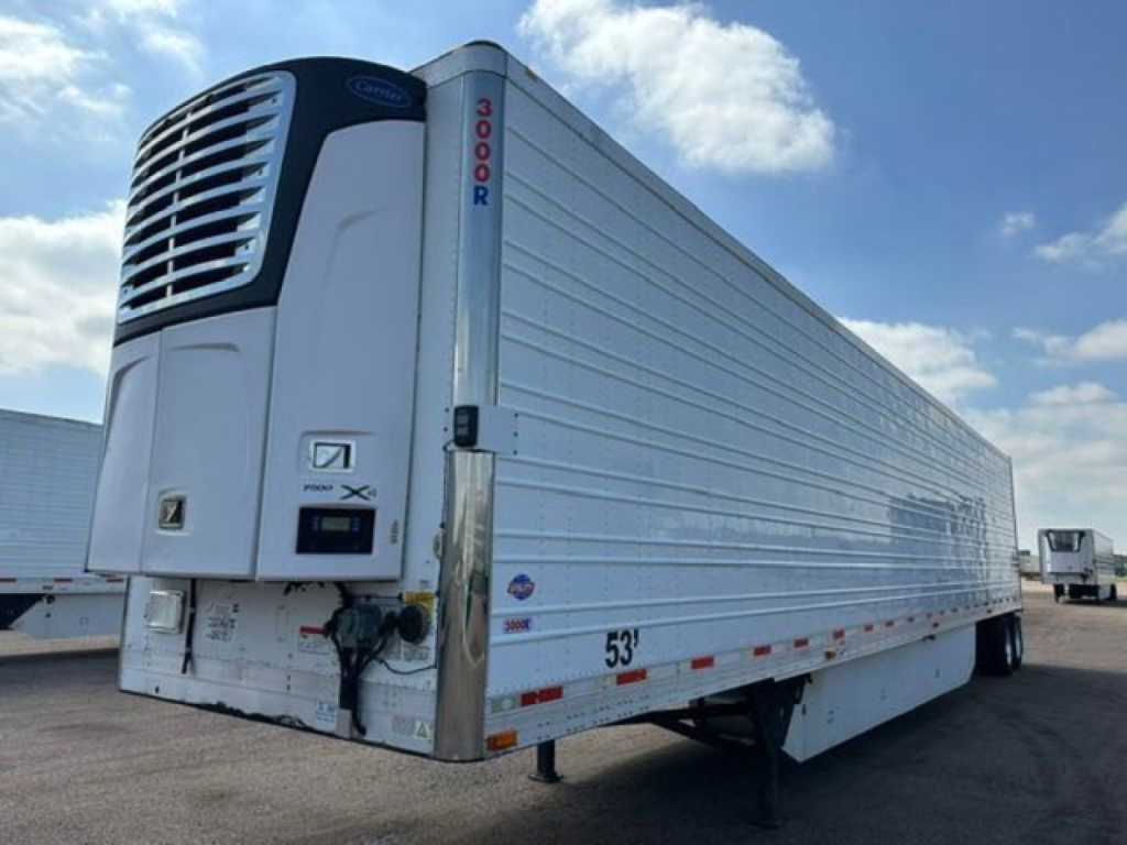 Refrigerated semi-trailer with Thermo King unit and vertical '3008R' boarding post, white with ribbed side panels, rear doors visible, stock U90981.