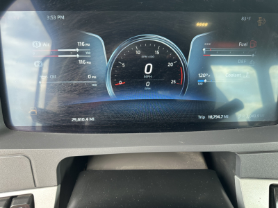 Kenworth T880 instrument cluster display showing digital speedometer at 0 MPH, gauges for air pressure, oil, fuel, coolant, and trip meters; VIN and stock number not visible on dash, mixer category implied.