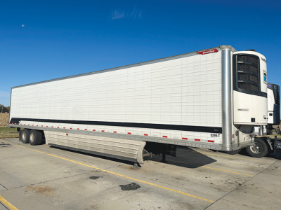 Great Dane Everest SS reefer trailer side view showing rear Cummins refrigeration unit and aluminum side panels.