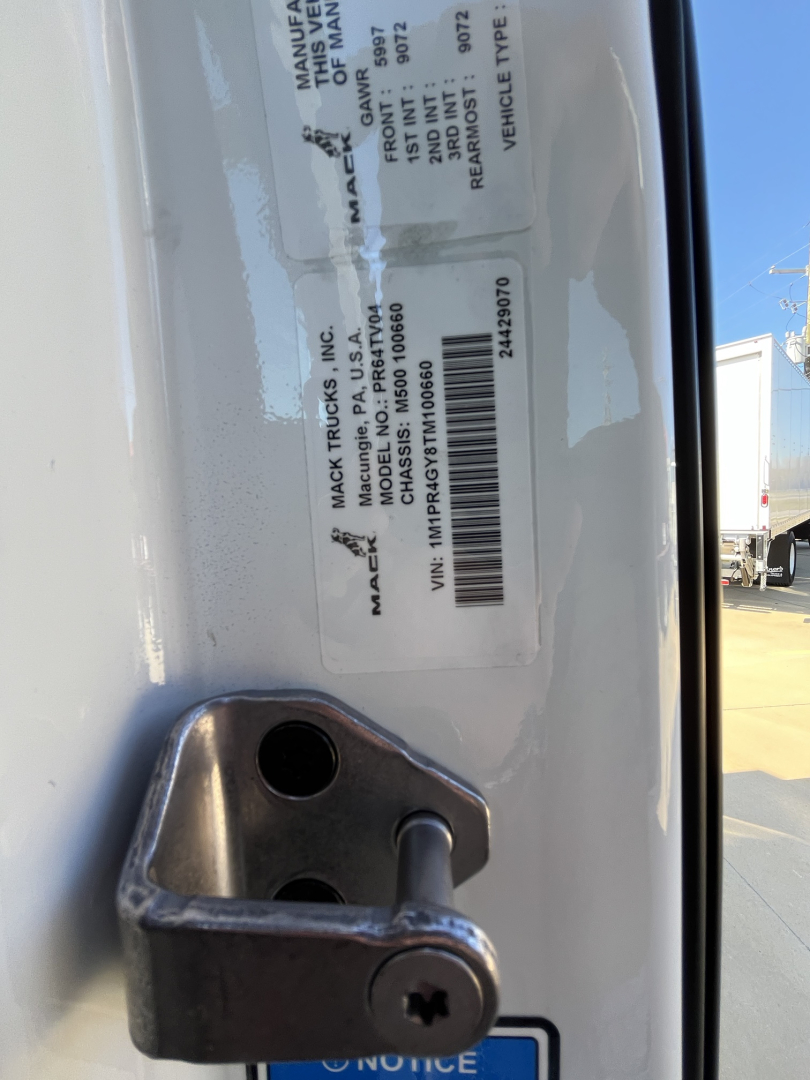 Label on Mack PR64T76M showing VIN, stock number, and vehicle type; text includes MANUFACTURE, MACK TRUCKS, INC., P.A., VIN 1M1PR4GY8TM100660, STOCK 71172, VEHICLE TYPE: CONVENTIONAL SLEEPER, NEW