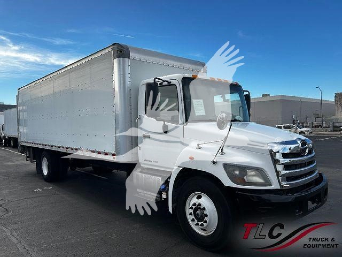 Box truck showing cab and cargo box; no legible labels or stickers visible on the side.