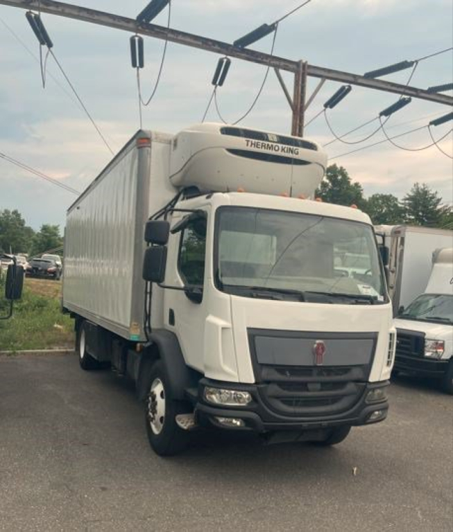 Truck cab with Thermo King reefer unit on top, white refrigerated box, Kenworth medium-duty cab, front view.