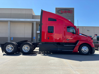 Kenworth T680 tractor in red color shown in profile view with sleeper cab and dual rear axles.