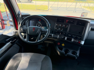 Kenworth T680 dashboard and steering wheel view with gauges and controls