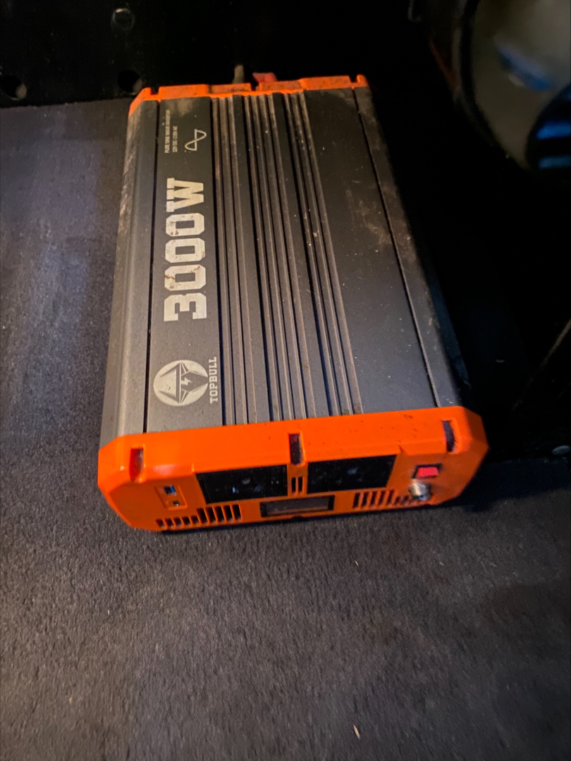 DC-DC 3000W inverter unit with orange end caps, black body, and cooling fins.