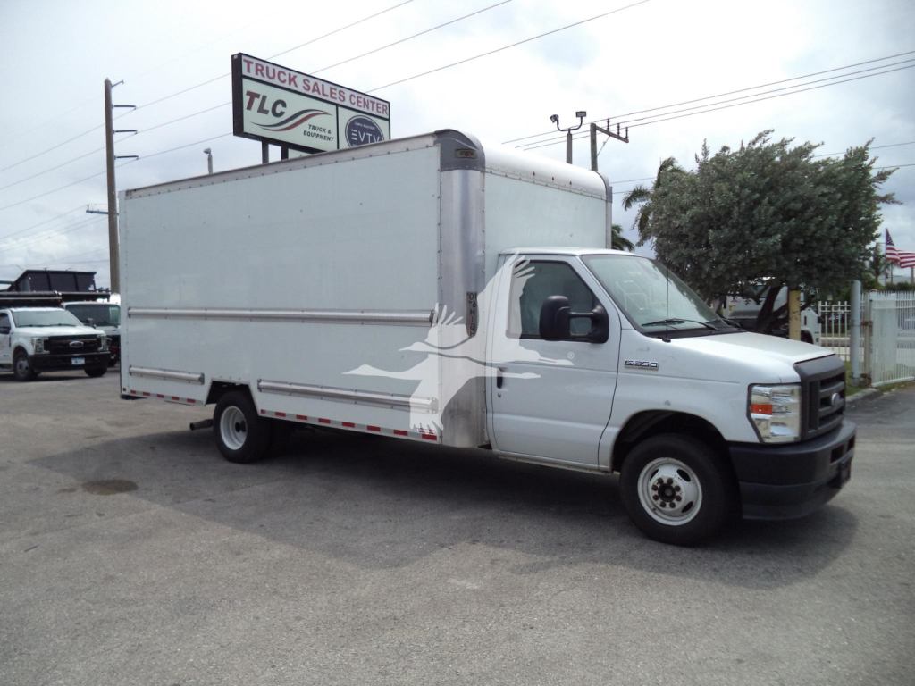 Ford E-350 box truck side view showing large cargo box and cab front.