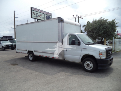 Ford E-350 box truck side view showing large cargo box and cab front.