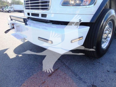 Front view of a Freightliner Business Class M2 106 truck showing a white bumper with integrated lights and winch mounting area.