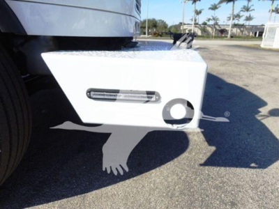 Freightliner Business Class M2 106 side step with winch mount and light. Visible text on door area includes small rectangular label; wheel and bumper are visible.