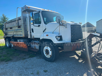 2015 Freightliner 108SD plow truck showing side and front view with plow equipment attached and dump bed.