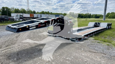 XL Specialized XL110HDGS lowboy trailer showing dual deck with metal frame and branding on side.