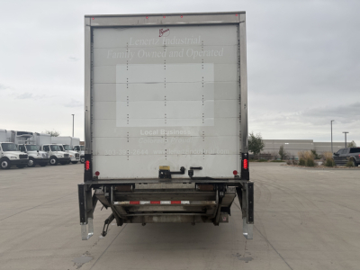 Kenworth T270 box truck rear view showing back doors and undercarriage with bumper, taillights, and холд platform.