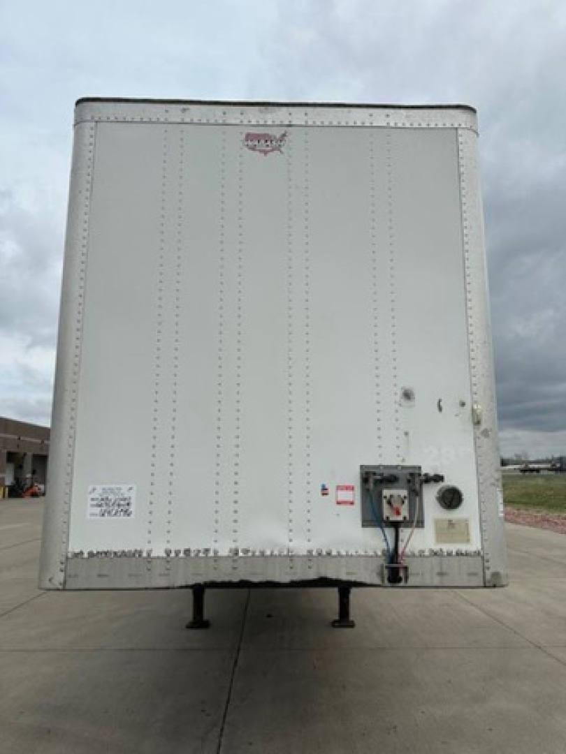 Back of a white Wabash van trailer with entry box and jack pads visible, stock U90896, VIN 1JJV532DXGL908626.