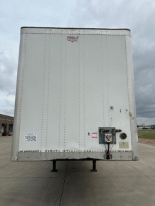 Back of a white Wabash van trailer with entry box and jack pads visible, stock U90896, VIN 1JJV532DXGL908626.