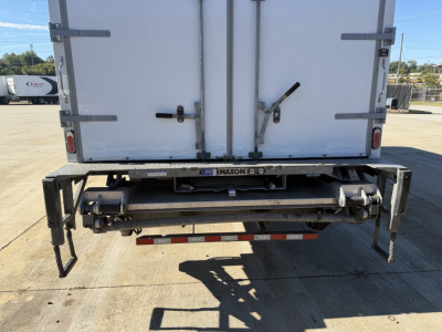 Kenworth T270 rear view showing truck box and rear bumper with Maxon liftgate and dual undercarriage wheels.