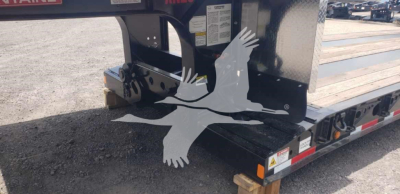 Fontaine Renegade X20 trailer hitch area showing undercarriage and support with safety decals.