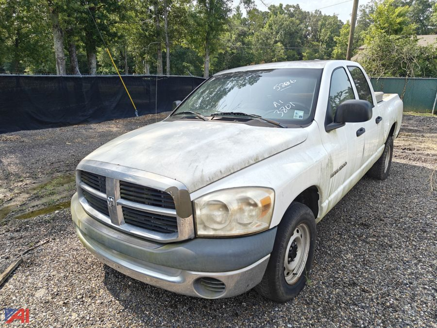 Dodge Ram 1500 pickup truck front-left view showing two-tone bumper and side mirrors