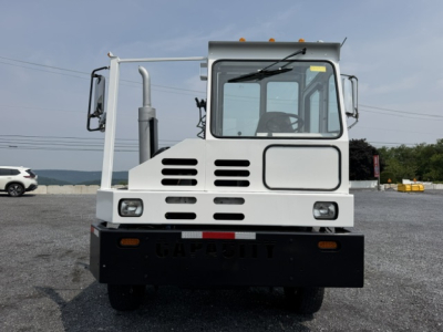 Capacity TJ5000 yard truck front view showing cab, grille vents, and solid front bumper.