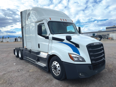 2020 Freightliner Cascadia126 tractor in white with blue accents, front three-quarter view, sleeper cab, stock number 550719.